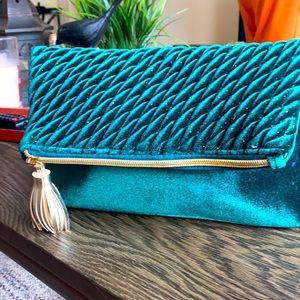 Emerald green clutch or travel bag.